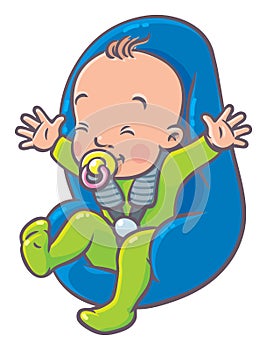 Funny small baby with dummy in the car seat