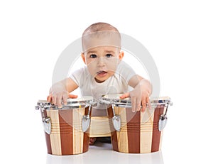 Funny smiling baby with bongos