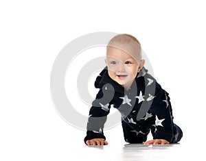 Funny smiling baby boy crawling isolated on white