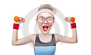 Funny sports woman with dumbbell