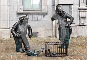 Funny statue in the street of Namur Belgium