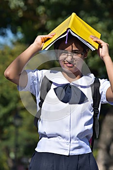 Funny Or Stupid Student Holding Books