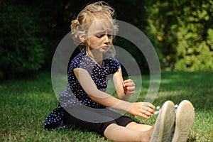 Funny Surprised Little Blonde Girl Screaming in the Park. Outdoors Portrait of Happy Acive Female Child