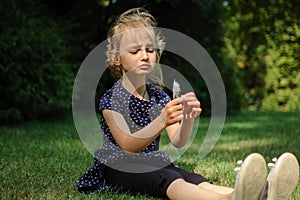Funny Surprised Little Blonde Girl Screaming in the Park. Outdoors Portrait of Happy Acive Female Child