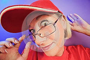 Funny surprised woman in glasses portrait