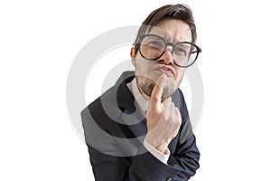 Funny suspicious or confused businessman is looking at you. Isolated on white background photo