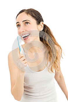 Funny teethbrushing woman