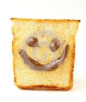 Funny toast bread with chocolate smile