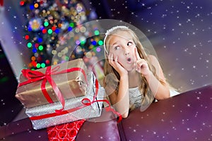 Funny toddler girl celebrate Christmas and New Year