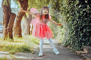 Funny Toddler Girl Dancing and Singing in Ballerina Style Dress