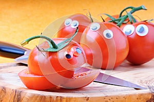 Funny tomatoes with googly eyes