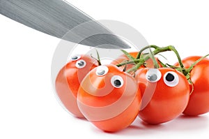 Funny tomatoes with googly eyes