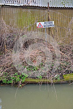 Funny traffic sign saying cyclists dismount here