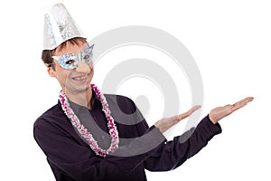 Funny ugly nerd man with party mask pointing