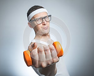 Funny weak man lifting biceps