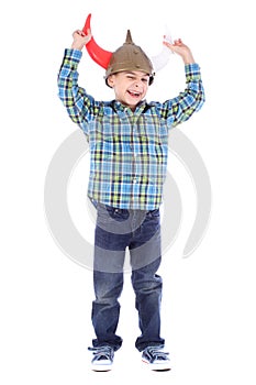 Funny winking young boy with viking helmet