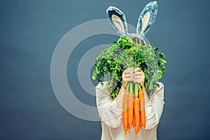 Funny woman with fresh carrot. Picture with space for your text