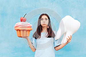 Funny Woman Holding Big Cupcake and Tooth
