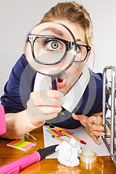 Funny woman office working secretary with magnifier