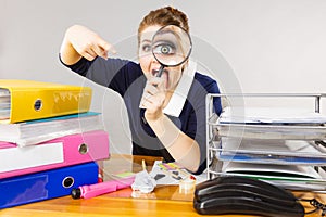 Funny woman office working secretary with magnifier