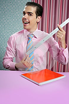 Funny young businessman with measuring ruler