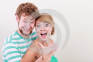 Funny young couple making silly face