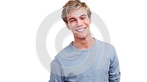 Funny young man smile, laughing and cheerful posing on white studio background. Portrait of cool, carefree and handsome