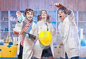 Funny young scientists in lab together