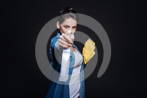 Funny young woman preparing for cleaning