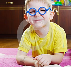 Funy boy in glasses