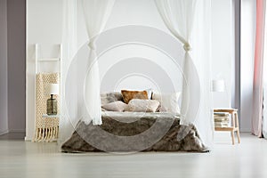 Fur bedding in comfy interior photo