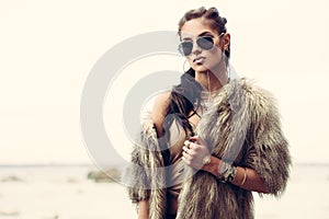 Fur coat and flash tattoos