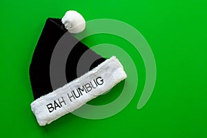 Fur hat saying Bah Humbug on a green background photo