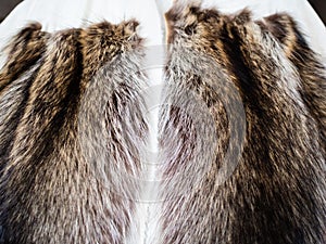 Fur pelts stitched to the textile layout close up