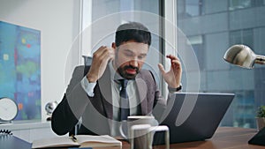 Furious businessman shouting remote conference sitting office workspace closeup.