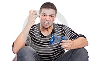 Furious man with a joystick for game console