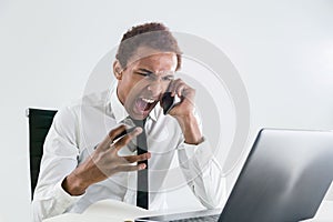 Furious man shouting on phone