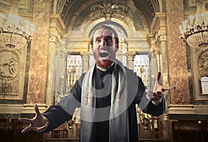 Furious priest photo