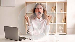 Furious rage screaming woman work problem mad