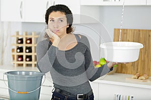 furious woman dealing with water leaks