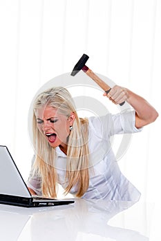Furious Woman About to Smash Laptop photo