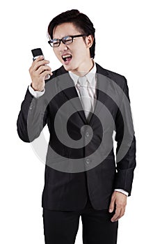 Furious worker screaming on his cellphone