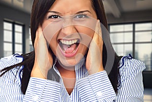 Furious young woman screaming commercial photo