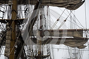 Furled sails and rigging on a tall ship