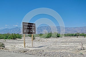 Furnace Creek road sign in Death Valley photo