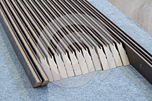 Furniture accessories. Manufacture of skirting boards in a furniture factory.