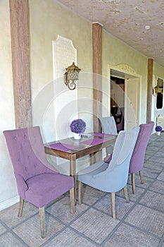 Furniture in a corridor of the guest house. Provence style