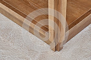 Furniture of toned ash timber in cookhouse on open terrace close up photo