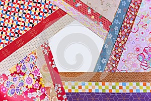 Furoshiki cloths arranged in a pentagonal formation featuring classic Japanese designs.