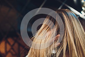 Fury and big anger inside of people. Blonde furious woman pulling blonde hair out of head. Emotional young girl showing her bad